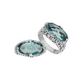 Handcrafted Blue Topaz Quartz oval sterling silver ring with floral detailing from Bali Designs Inc 
