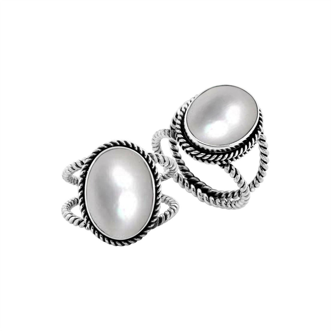 Sterling Silver oval shape ring with Black Shell and braided rope detailing