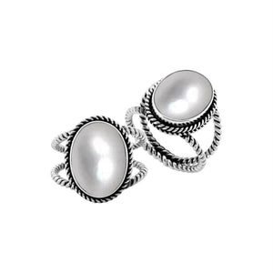 Sterling Silver oval shape ring with Black Shell and braided rope detailing