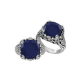 Sterling Silver ornate statement ring with Blue Sapphire and intricate Bali-inspired detailing.