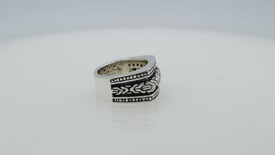 Wholesale sterling silver Bali wide band ring with oxidized finish and intricate artisan carving design, bulk handcrafted silver jewelry for resellers.