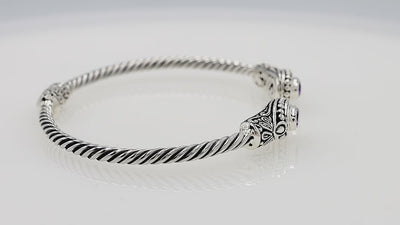 Silver twisted cable bangle in 925 sterling silver with Blue Topaz Quartz and Balinese engraving.