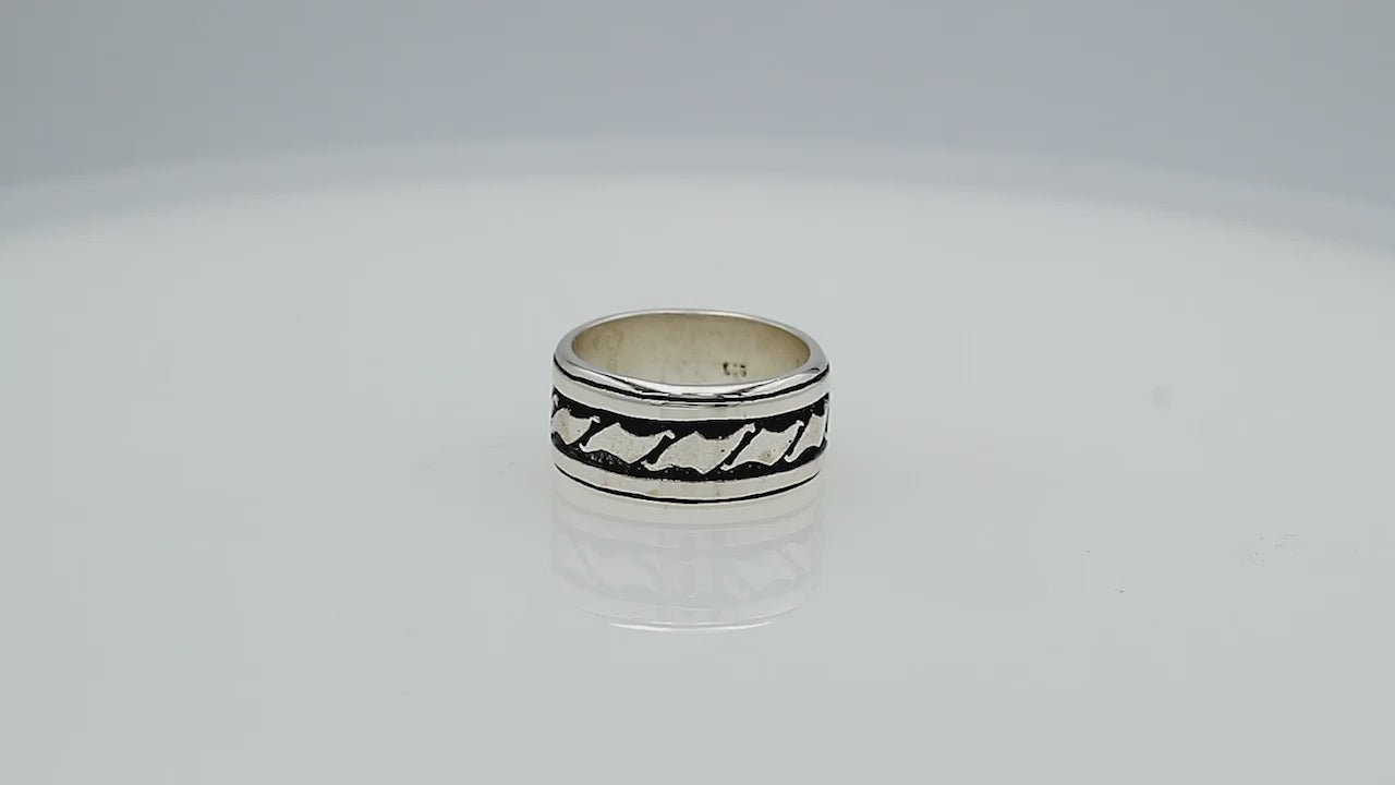 Wholesale sterling silver wide band ring with wave-inspired Bali design and oxidized details, handcrafted unisex artisan jewelry in bulk for retailers and resellers.