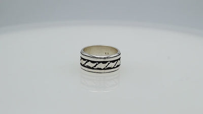 Wholesale sterling silver wide band ring with wave-inspired Bali design and oxidized details, handcrafted unisex artisan jewelry in bulk for retailers and resellers.