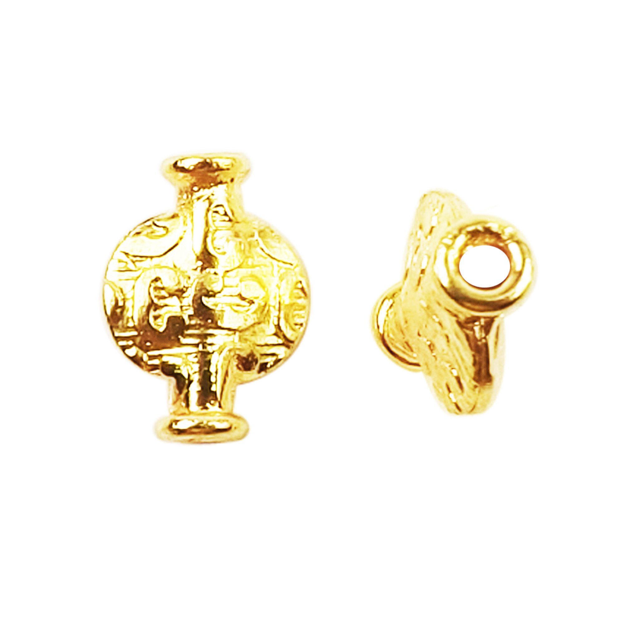 Handcrafted vessel-shaped decorative bead with engraved texture in 18K gold overlay over copper for wholesale jewelry production.