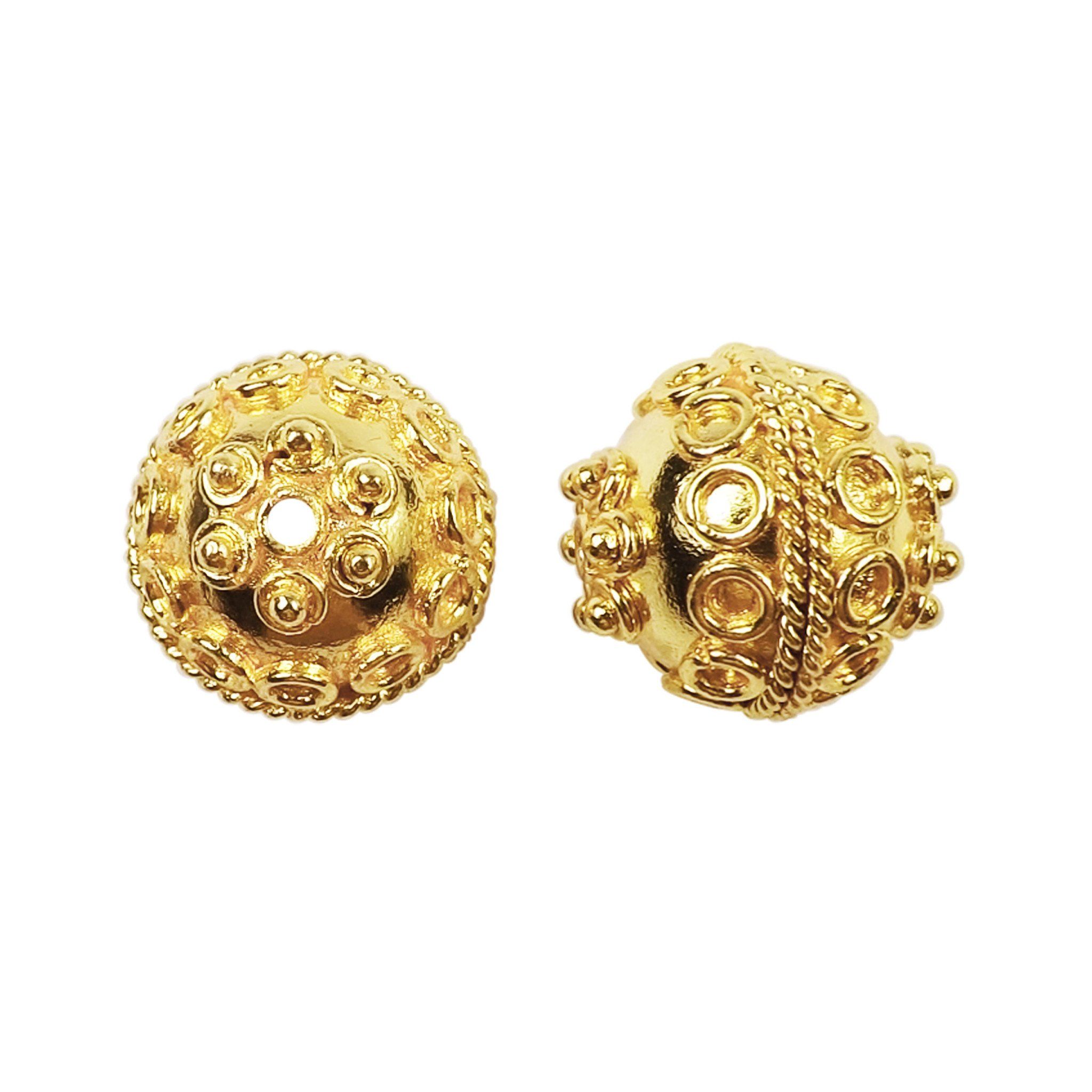 Handcrafted textured round bead with raised circular pattern in 18K gold overlay over copper