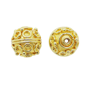 Handcrafted India round bead with 18K gold overlay over copper featuring textured circular design for bulk jewelry making.