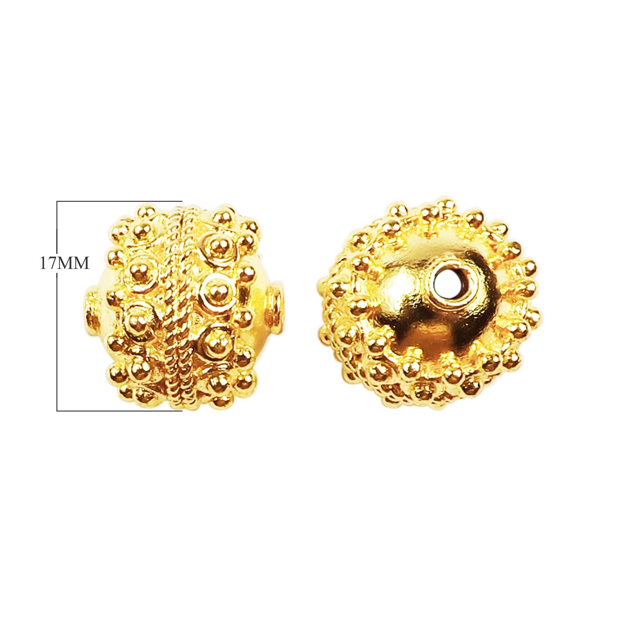 Handcrafted granulated round copper bead with 18K gold overlay featuring raised dot patterns, made in India for wholesale jewelry production.