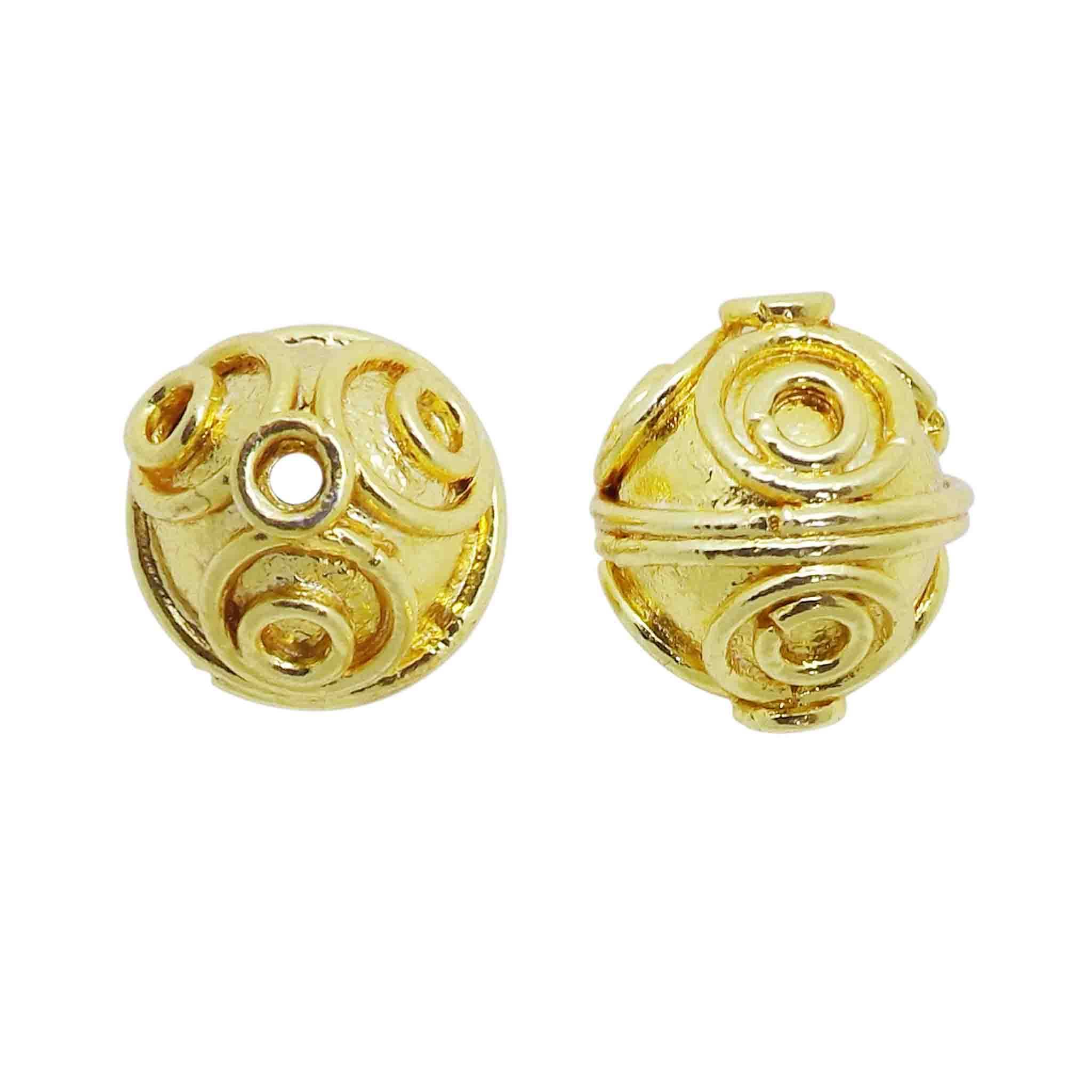 Handcrafted swirl-pattern engraved round bead with 18K gold overlay over copper, made in India for wholesale jewelry production.