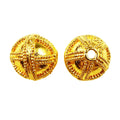 Handcrafted round bead with cross-pattern granulated detailing and 18K gold overlay over copper, made in India for wholesale jewelry production.