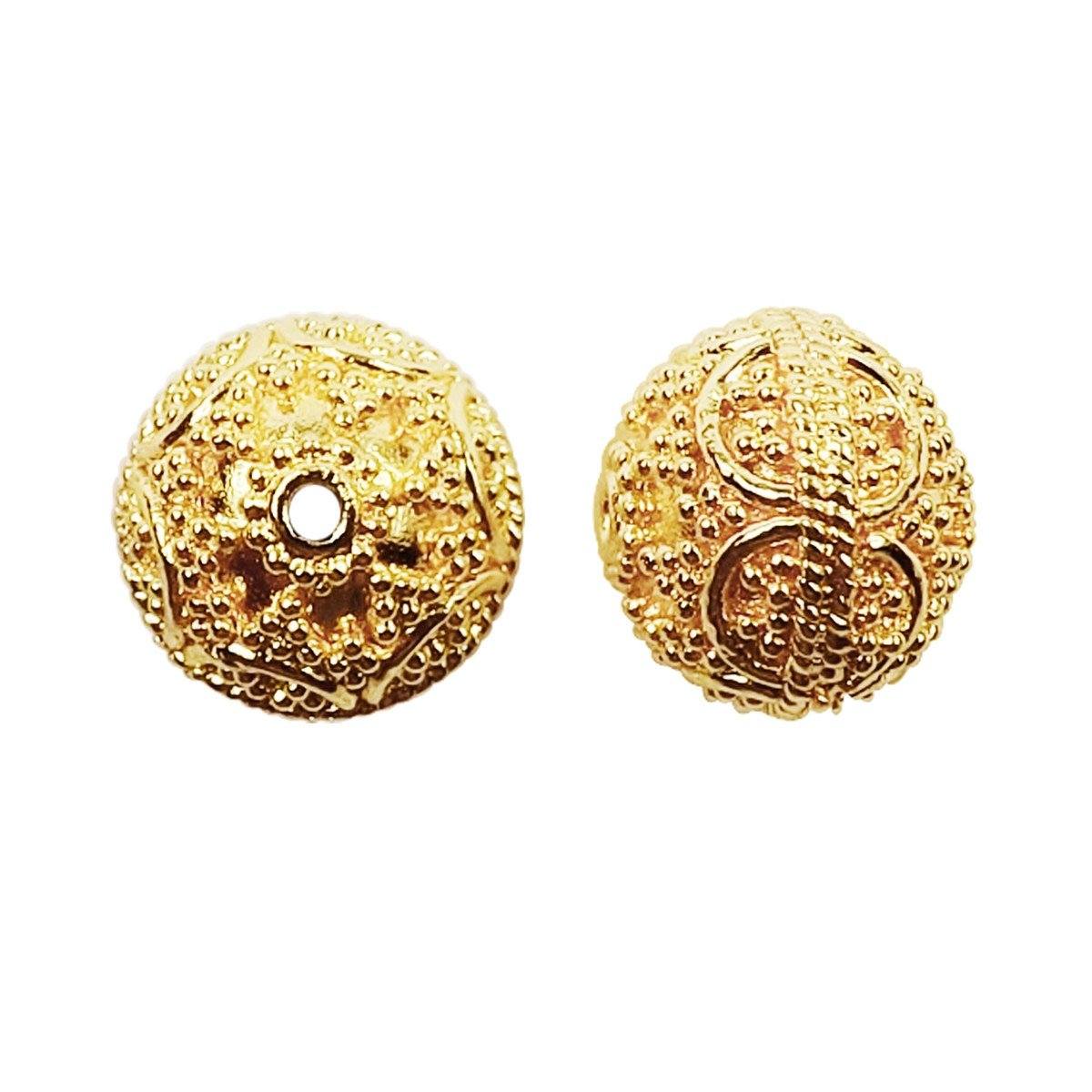 Handcrafted round bead with floral granulation and 18K gold overlay over copper, made in India for wholesale jewelry production.
