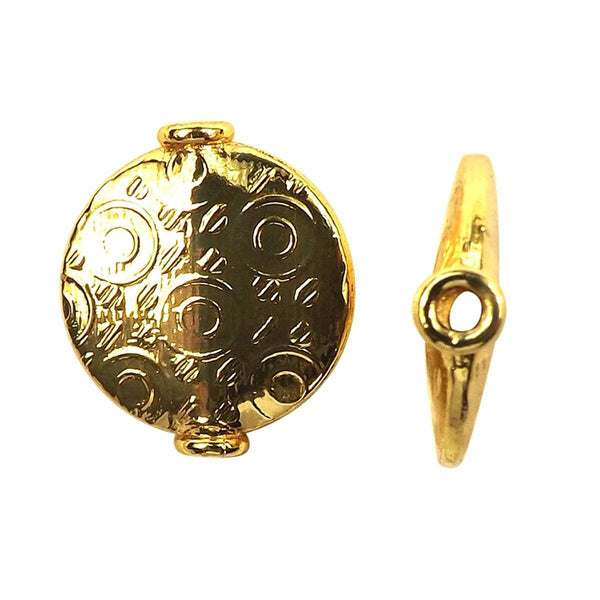 Handcrafted flat disc bead with embossed circular pattern and 18K gold overlay over copper, made in India for wholesale jewelry production.