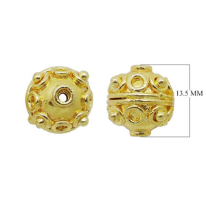 Handcrafted embossed ring-motif round bead with 18K gold overlay over copper, made in India for wholesale jewelry production.