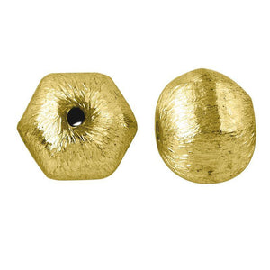 Handcrafted brushed hexagon bead with 18K gold overlay over copper, made in India for wholesale jewelry manufacturing.