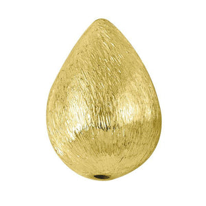 Teardrop-shaped brushed bead with 18K gold overlay over copper, handcrafted in India for wholesale jewelry production.