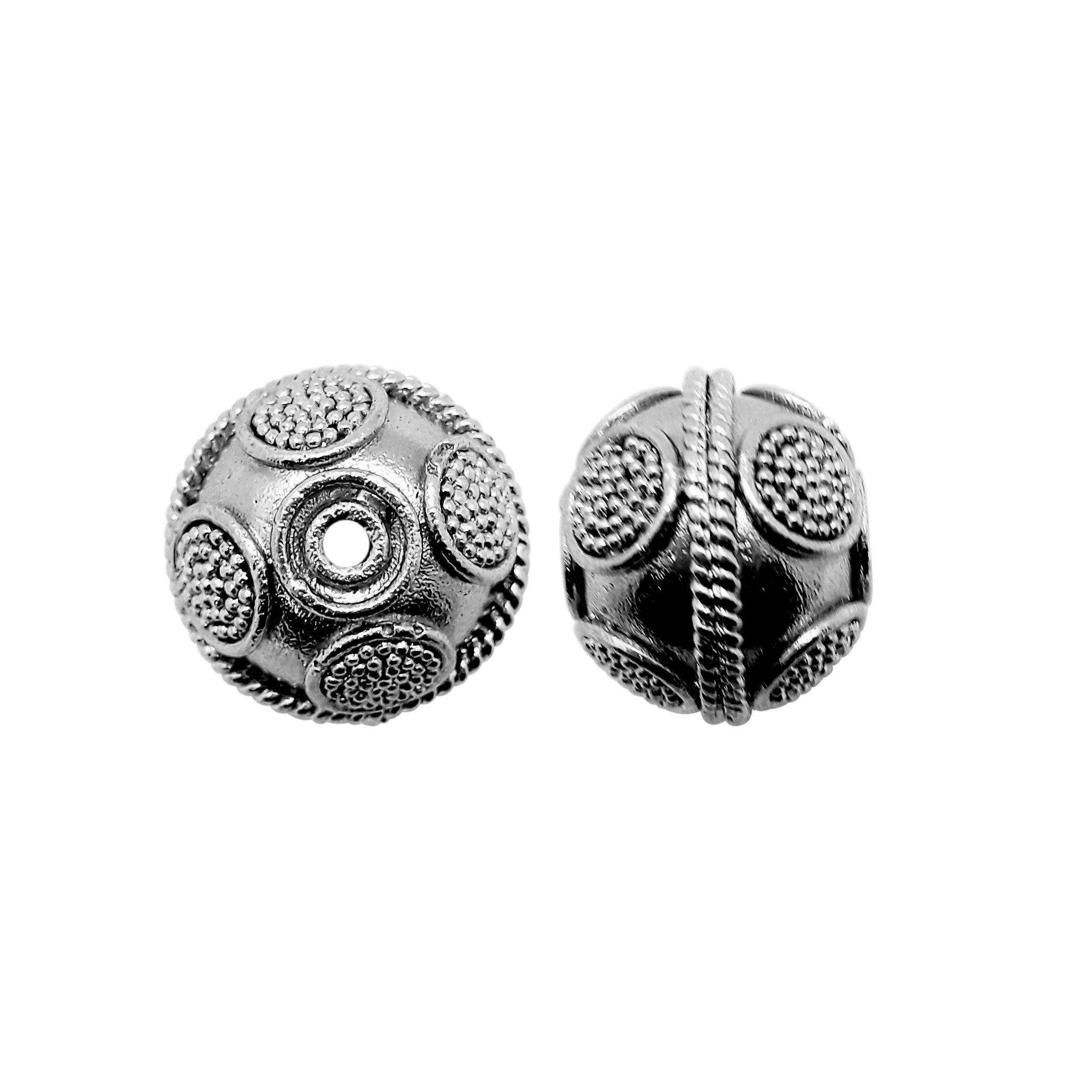 Handcrafted black rhodium overlay copper spherical bead with dotted panel texture made in India for wholesale jewelry production