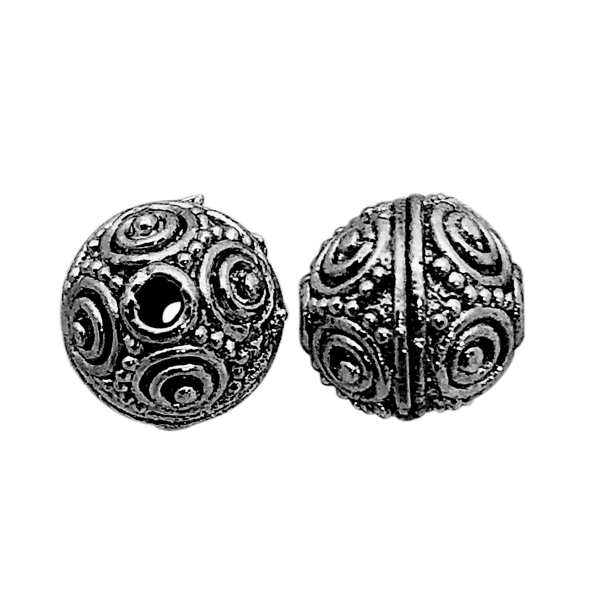 Black rhodium overlay over copper ornate round bead handcrafted in India for wholesale jewelry making