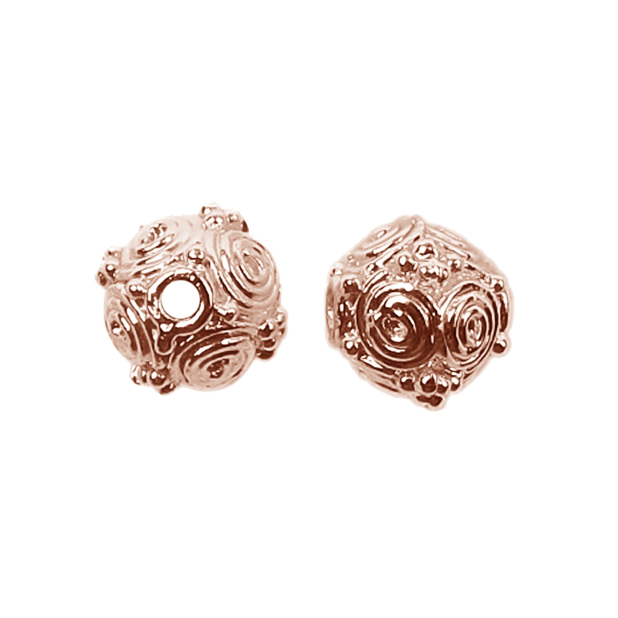 Rose gold overlay copper spiral motif beads handcrafted in India for wholesale jewelry making
