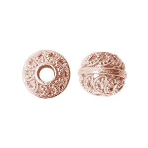 Rose Gold overlay over copper textured spherical bead handcrafted in India for wholesale jewelry making