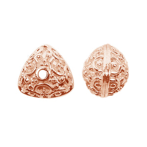 Rose Gold overlay over copper handcrafted spacer bead from India with raised circular motif design