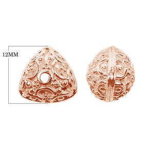 Rose Gold overlay over copper handcrafted spacer bead from India with raised circular motif design