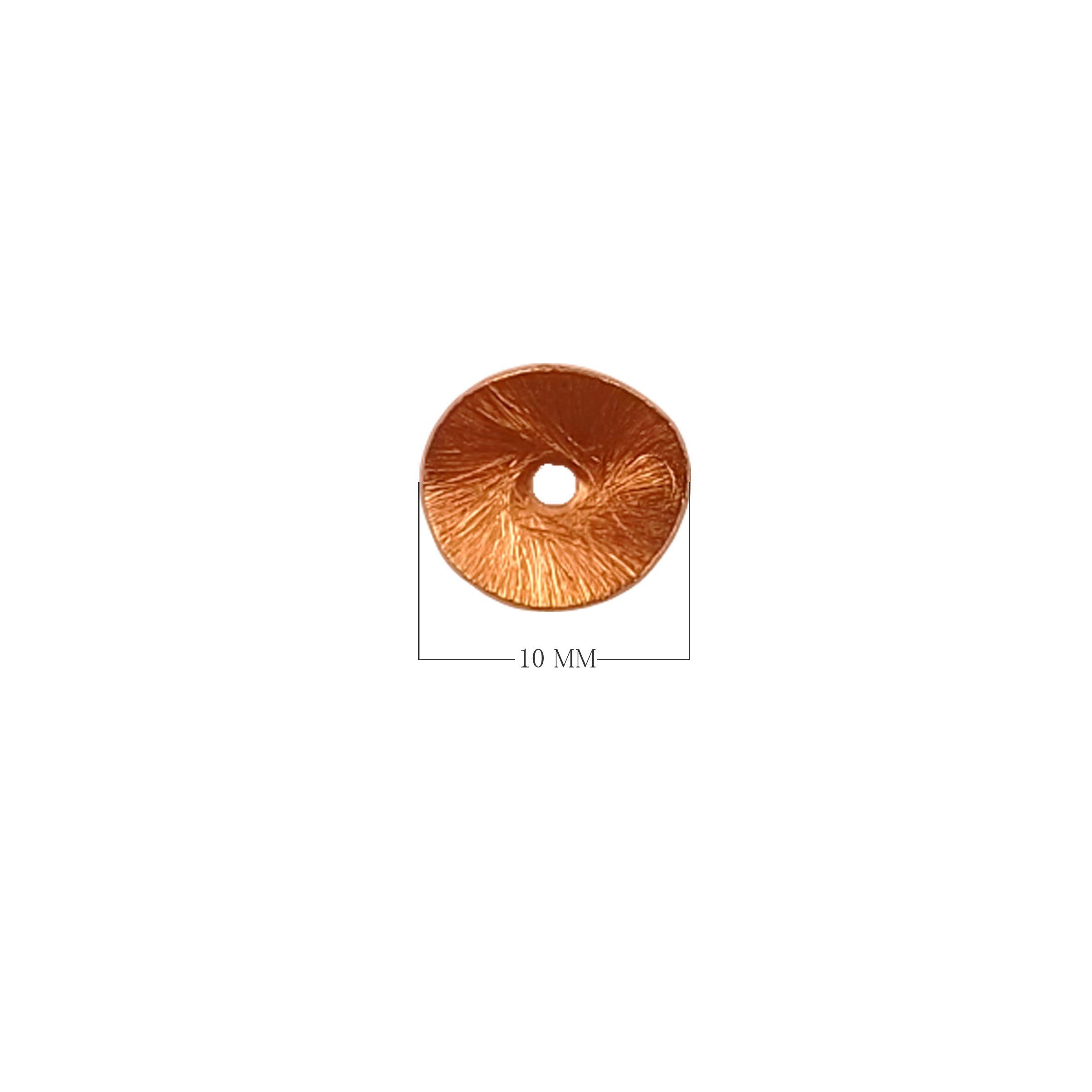 Rose gold overlay over copper textured disc handcrafted in India for wholesale metal components