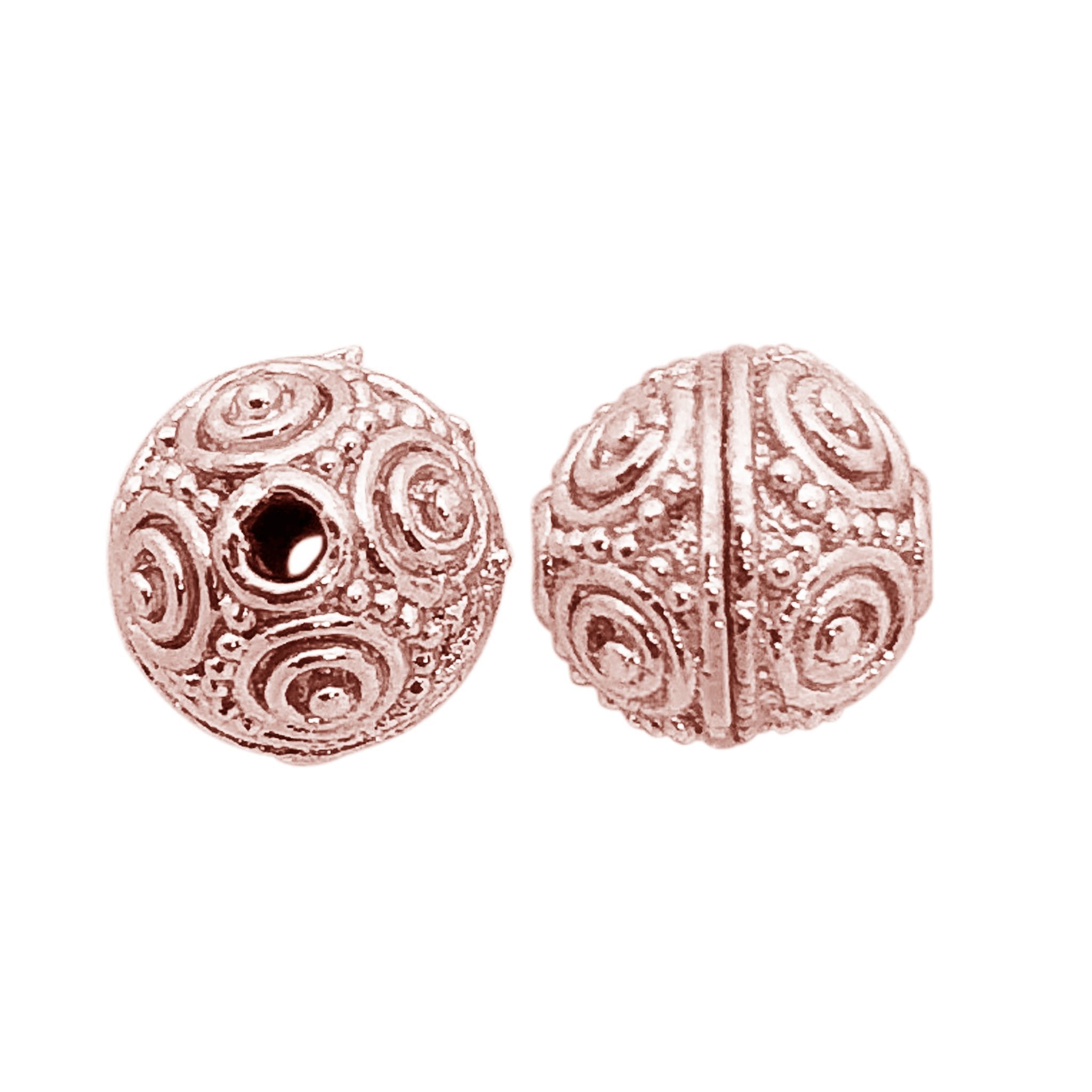 Rose gold overlay over copper ornate round bead handcrafted in India for wholesale metal components