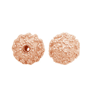 Rose gold overlay over copper granulated floral bead handcrafted in India for wholesale metal components