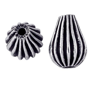 Handcrafted ribbed drop bead with silver overlay over copper and antique finish made in India