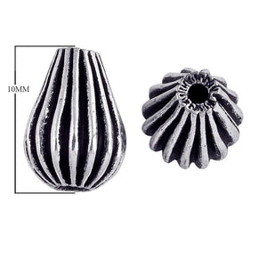 Handcrafted ribbed drop bead with silver overlay over copper and antique finish made in India