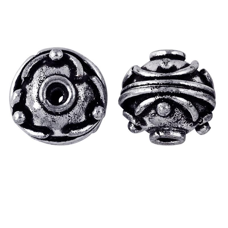 Antique silver overlay over copper round spacer bead with raised dot design handcrafted in India for wholesale jewelry use.