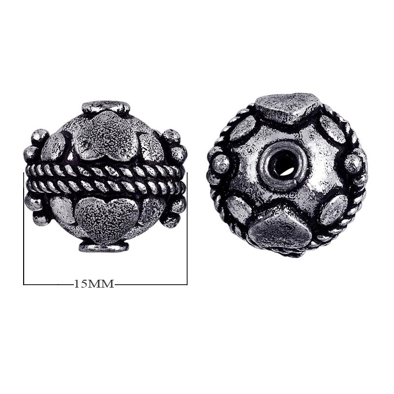 Silver overlay over copper faceted motif round bead from India with oxidized silver finish for wholesale jewelry making