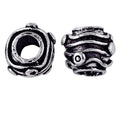 Antique silver overlay over copper handcrafted spacer bead from India with textured ethnic design