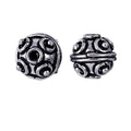 Silver overlay over copper handcrafted orb bead from India with raised circular design and antique finish