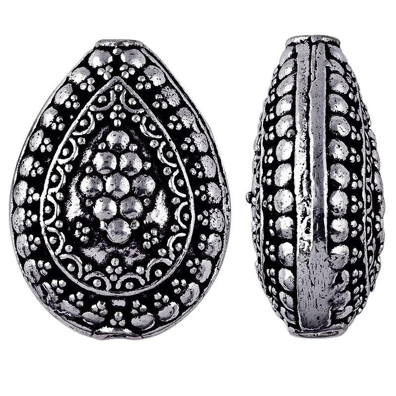 Silver overlay over copper handcrafted teardrop bead from India with floral dotted design and antique finish