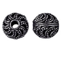 Silver overlay over copper handcrafted swirl pattern bead from India with antique silver finish