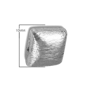 Handcrafted silver textured geometric bead with silver overlay over copper, made in India for wholesale jewelry making.
