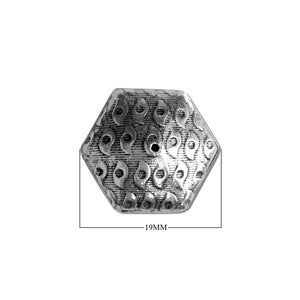 Handcrafted hexagon bead cap with silver overlay over copper, featuring engraved motif texture and oxidized finish, made in India.