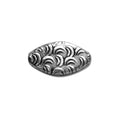 Handcrafted leaf-shaped bead cap with silver overlay over copper, featuring curved textured motifs and oxidized finish, made in India.
