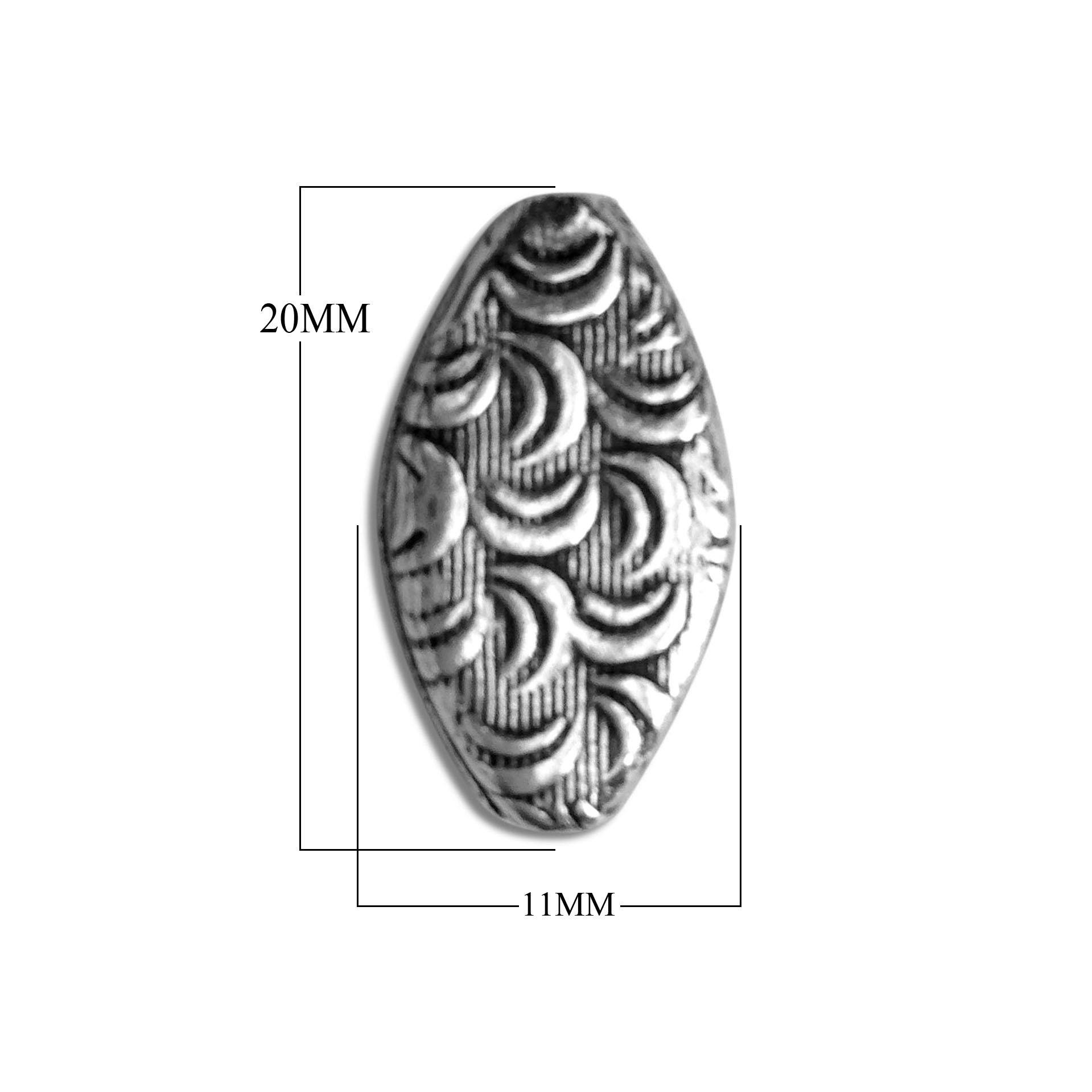 Handcrafted leaf-shaped bead cap with silver overlay over copper, featuring curved textured motifs and oxidized finish, made in India.