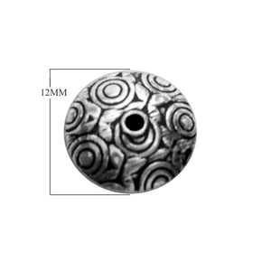 Handcrafted round silver overlay over copper bead with concentric circular Indian design and antique finish