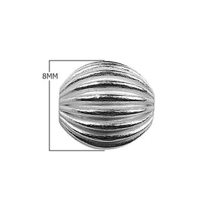 Handcrafted ribbed round silver overlay over copper bead with uniform textured design from India