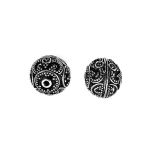 Handcrafted granulated round silver overlay over copper bead with curved Indian design