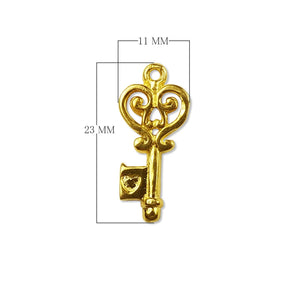Vintage ornate key charm made with 18K Gold Overlay Over Copper, handcrafted in India for wholesale jewelry production.