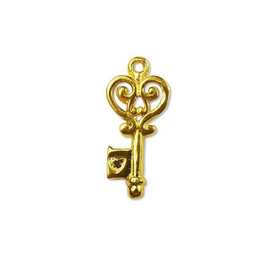 Vintage ornate key charm made with 18K Gold Overlay Over Copper, handcrafted in India for wholesale jewelry production.
