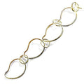 18K Gold Overlay Over Copper wave form link chain featuring curved flowing links designed for wholesale jewelry manufacturing and motion inspired designs
