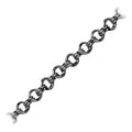 Fine oval link chain made with Black Rhodium Overlay Over Copper featuring polished dark finish, smooth oval links, and durable construction sold per foot for wholesale jewelry manufacturing