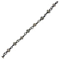 Oval link chain made with Rhodium Overlay Over Copper featuring Labradorite bead accents, polished dark finish, and durable construction sold per foot for wholesale jewelry manufacturing