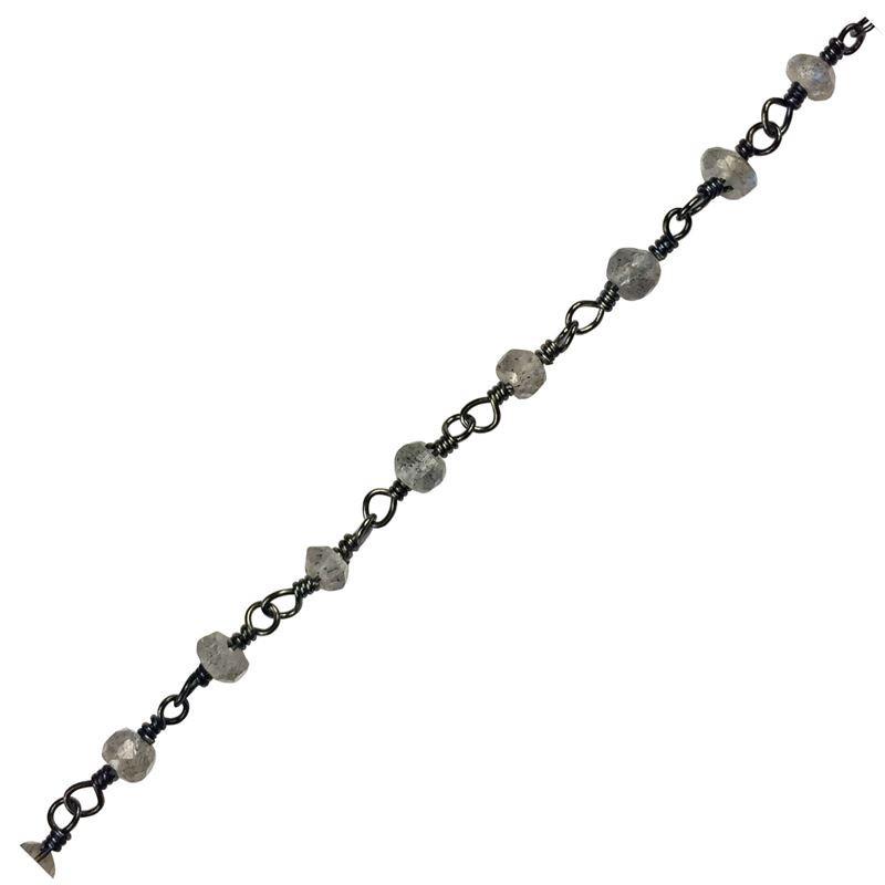Oval link chain made with Rhodium Overlay Over Copper featuring Labradorite bead accents, polished dark finish, and durable construction sold per foot for wholesale jewelry manufacturing
