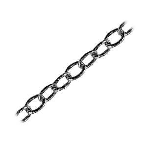Oversized oval link chain made with Black Rhodium Overlay Over Copper featuring textured dark finish, elongated bold links, and durable construction sold per foot for wholesale jewelry manufacturing